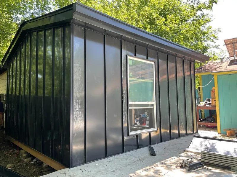 Black standing seam metal wall panels for Roof Inspection in Bossier City